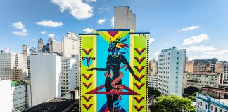 Mural em grafite, feito pela artista Criola, representa simbologias da cultura afro-brasileira