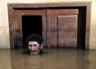 João Pereira de Araújo photographed by Gideon Mendel for his "Submerged Portraits" series.