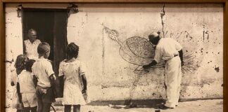 Chico da Silva desenhando em uma parede